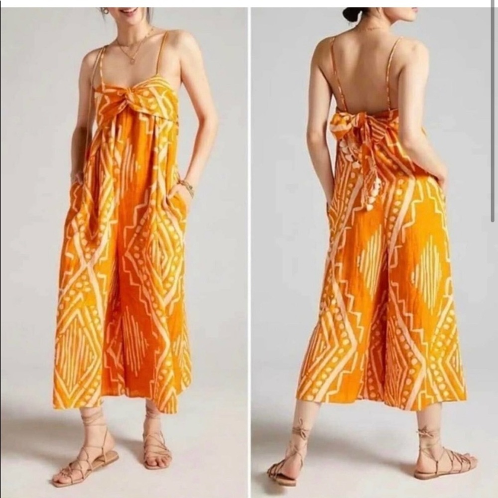 Anthropologie darling orange jumpsuit. So cute!